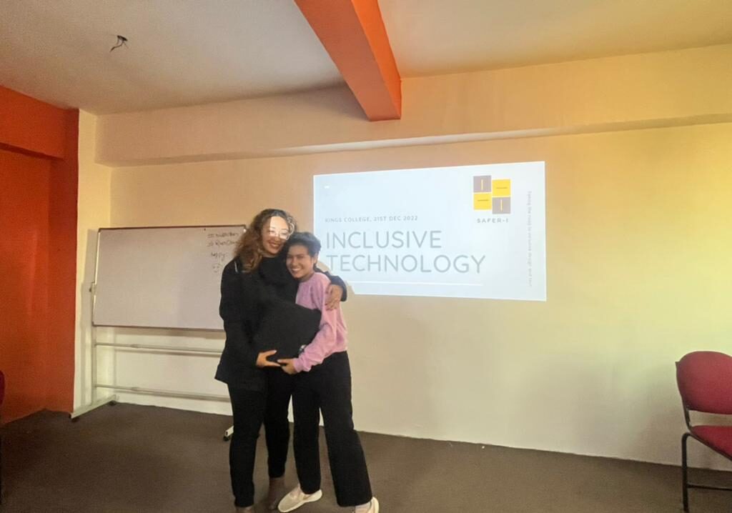 Sonika Baniya (Project Lead) receives a token of love from the OSRL team.